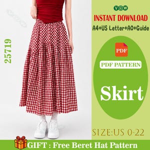 Op de afbeelding: Een rood-witte geruite rok is afgebeeld. De rok heeft een midi-lengte en een gelaagd ontwerp. De afbeelding bevat ook de tekst "Skirt", "PDF Pattern" en "SIZE: US 0-22".