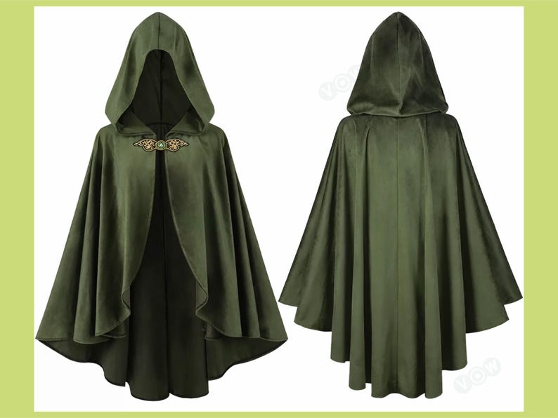 May include: Olive green hooded cloak with a decorative clasp. The cloak is made of a soft fabric and features a hood and a flowing design. The image shows the front and back of the cloak.