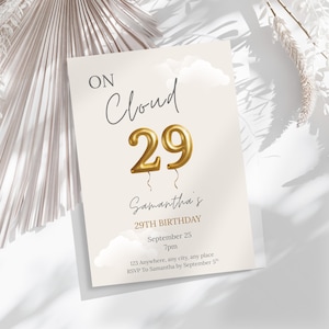 May include: A cream-colored birthday invitation with the text "ON Cloud 29" in a handwritten font. The number "29" is in gold balloon style. The invitation includes the name "Samantha's", the date, time, and RSVP information.