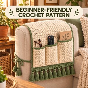 May include: A cream-colored crochet armrest organizer with three pockets, green trim, and green tassels. The organizer is draped over a sofa arm and holds eyeglasses, a remote control, and a small notebook. Text reads: BEGINNER-FRIENDLY CROCHET PATTERN.
