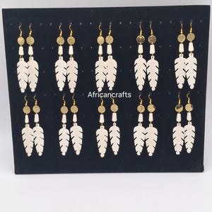 Pendientes africanos zulú al por mayor, accesorios tribales artesanales para mujeres masái, pendientes de latón y hueso hechos a mano.