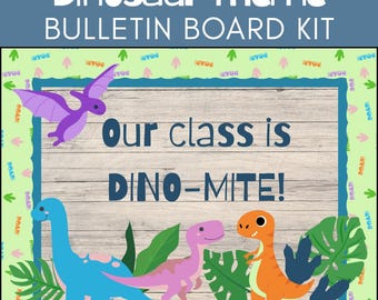 May include: Dinosaur-themed bulletin board kit with the text "Our class is DINO-MITE!" in blue. The design includes a purple pterodactyl, a blue Brontosaurus, a pink dinosaur, and an orange T-Rex, with green foliage.