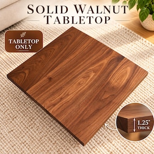 May include: A square solid walnut tabletop with a natural wood grain finish. The text on the image reads SOLID WALNUT TABLETOP, TABLETOP ONLY, and a circular inset shows the edge with a measurement of 1.25 inches thick.