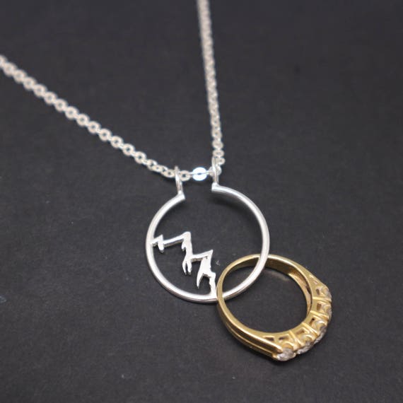 his wedding ring made into her heart pendant - R H Weber Jewelry, LLC