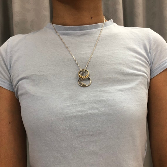 Bat necklace holder deals