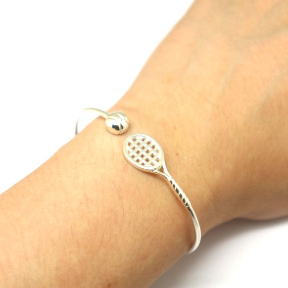 Bracelet with tennis balls outlet