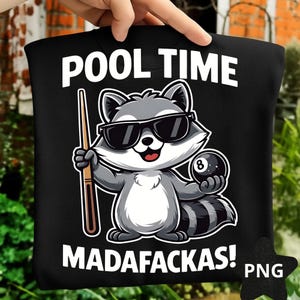 May include: Black t-shirt with a cartoon raccoon wearing sunglasses, holding a pool cue and an 8-ball. The text "POOL TIME MADAFACKAS!" is printed in white above and below the raccoon illustration.