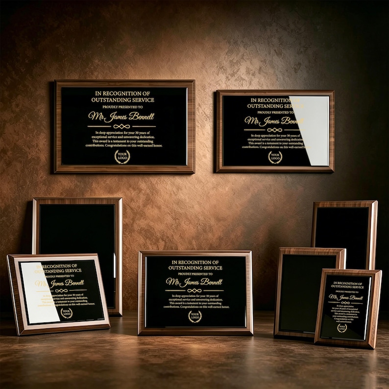 May include: A collection of rectangular wooden plaques with black glass centers. Each plaque features gold text reading IN RECOGNITION OF OUTSTANDING SERVICE, PROUDLY PRESENTED TO Mr. James Bennett, and includes a laurel wreath logo at the bottom.