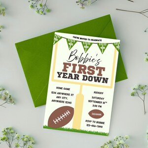 May include: An invitation for "Bobbie's First Year Down" football-themed party. The invitation features a football field design with a goalpost, footballs, and the text "You're Invited to Celebrate." The invitation is paired with a green envelope.