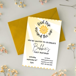 May include: A birthday invitation with a yellow and white gradient background. The invitation features the text "first trip around the sun" and "Bobbie's First Birthday". The invitation is accompanied by a yellow envelope.