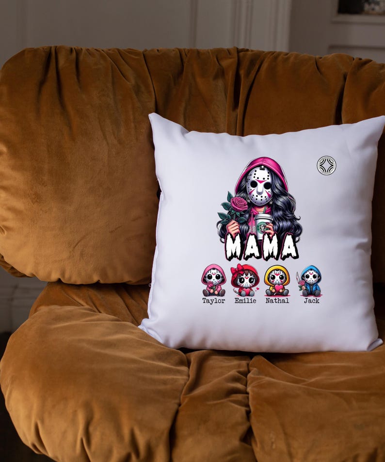 May include: White square pillow with a graphic of a woman in a hockey mask holding a rose and a coffee cup, with the word "MAMA" below. Four cartoon figures are below the word "MAMA", each with a name: Taylor, Emilie, Nathal, and Jack.