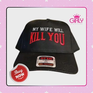 May include: Black baseball cap with the embroidered text "MY WIFE WILL KILL YOU" in red. The cap has a curved brim and a tag that reads "OTTO" and "MID PROFILE".