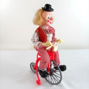 CLOSE OUT Vintage Clown on Bicycle -  1960s Plastic and Fabric toy - Made in Hong Kong