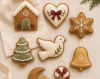 May include: A collection of eight felt Christmas ornaments including a gingerbread house, a heart with a red bow, a star, a green tree, a white dove, a bell, a crescent moon with a star, and a candy cane, all featuring white hanging loops.