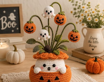 May include: A crochet potted plant featuring a white ghost base inside an orange jack-o'-lantern pot. The plant has green stems topped with three orange jack-o'-lanterns and two small white ghosts with pink cheeks and black eyes.