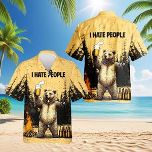May include: Yellow Hawaiian shirt with a bear graphic holding a beer and the text "I HATE PEOPLE". The design includes a forest scene with a campfire and beer bottles. The shirt is short-sleeved.