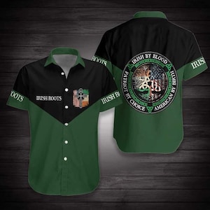 May include: Green, black, and white button-up shirt with short sleeves. The shirt features the text "IRISH ROOTS" and a graphic of a cross and flag on the front. The back of the shirt has a circular design with the text "IRISH BY BLOOD, AMERICAN BY BIRTH, PATRIOT BY CHOICE".