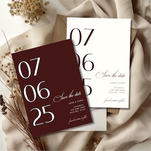 May include: Two wedding save-the-date cards. One is burgundy with the date 07 06 25 in large white numbers. The other is white with the same date in burgundy. Both cards say "Save the date" and include the names Piper & James.