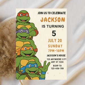 May include: A birthday party invitation featuring the Teenage Mutant Ninja Turtles. The invitation text reads "Join us to celebrate Jackson is turning 5" with date, time, and RSVP information. The turtles are in green, with orange, purple, red, and blue masks.