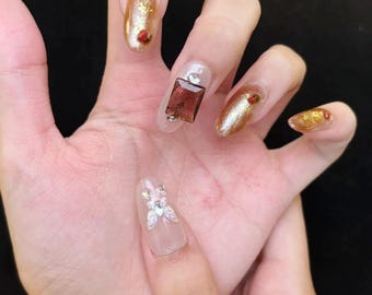 Uñas postizas de lujo con acabado cromado dorado – Juego de uñas con diseño de gemas 3D