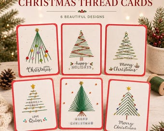May include: Six rectangular white greeting cards with red borders, each featuring a hand-embroidered Christmas tree design made with green thread, beads, and small stars. The cards include text such as Merry Christmas, Happy Holidays, and Love Quinn.