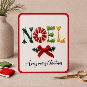 May include: A white greeting card with a red border featuring the word NOEL embroidered in green, red, and yellow thread. The O is a circular wreath with gold beads. Below is a red fabric bow with green leaves and the text A very merry Christmas.