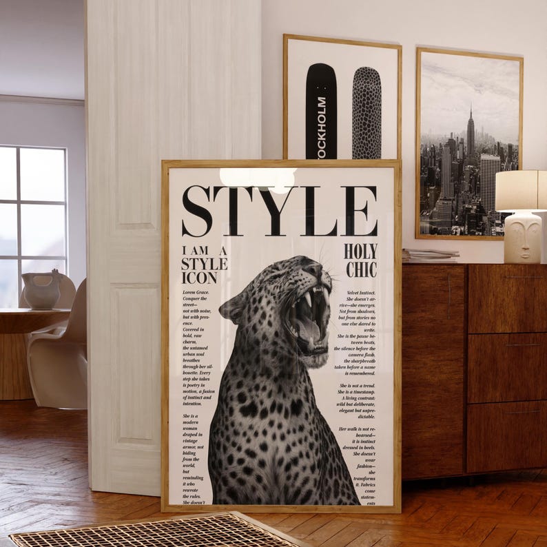 May include: A framed poster featuring the word "STYLE" in bold black lettering. Beneath the word is a monochrome image of a roaring leopard. The poster also includes the text "I AM A STYLE ICON" and "HOLY CHIC".