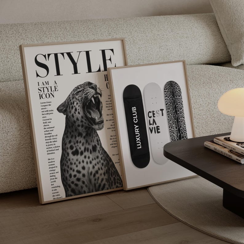 May include: Two framed art prints. One features a black and white image of a roaring leopard with the word "STYLE" at the top. The other has three skateboard decks, one black with "LUXURY CLUB", one white with "CEST LA VIE", and one with a leopard print.