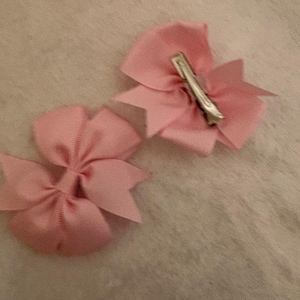 May include: A rustic wooden sign with the text "Welcome to our home" in a handwritten style. The sign features a distressed finish and a simple, inviting design, perfect for a front porch or entryway.