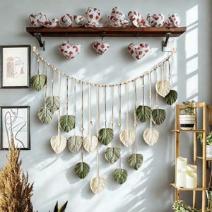 Macramé Leaf Garland Wall Hanging, Boho Nursery Decor, Green & Cream Banner with Wood Beads, 47&quot; Wide Leaf Wall Art for Bedroom Living Room