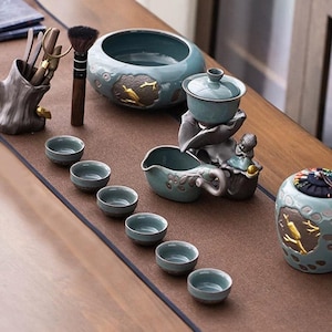 Zestawy do herbaty z ceramiki retro | Kreatywne automatyczne zestawy do herbaty Gaiwan | Ceramiczny młynek obrotowy do herbaty z kamiennym filtrem | Zestawy do herbaty na przyjęcie | Zestawy do herbaty Kung Fu