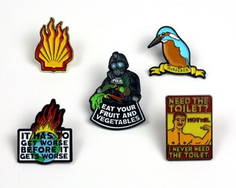 Enamel Badges by Darren Cullen. Shell/Hell, Bird Murderer, It Has to Get Worse Before It Gets Worse, Never Need the Toilet, Eat Fruit & Veg