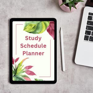 May include: A digital tablet displaying a "Study Schedule Planner" with watercolor floral accents in green and red. A white stylus and a laptop are nearby, suggesting a workspace. A small potted plant is also visible.