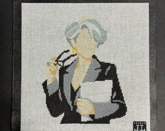 Tela ricamata a punto croce ispirata al film Il diavolo veste Prada