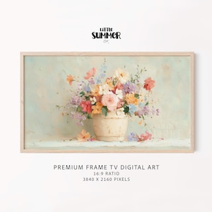 Op de afbeelding: Een ingelijste digitale kunstprint met een stilleven van kleurrijke bloemen in een crèmekleurige vaas. De bloemen omvatten roze, oranje, paarse en gele bloesems. Het kunstwerk staat tegen een zachte, lichtgroene achtergrond. De tekst "LITTLE SUMMER Co." staat bovenaan.