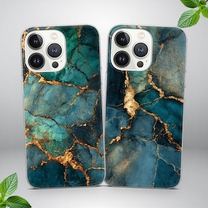 May include: Two phone cases with a teal and gold marble design. The cases have a clear border and a glossy finish. The teal color has darker shades of blue and green, with gold veins running throughout the design.