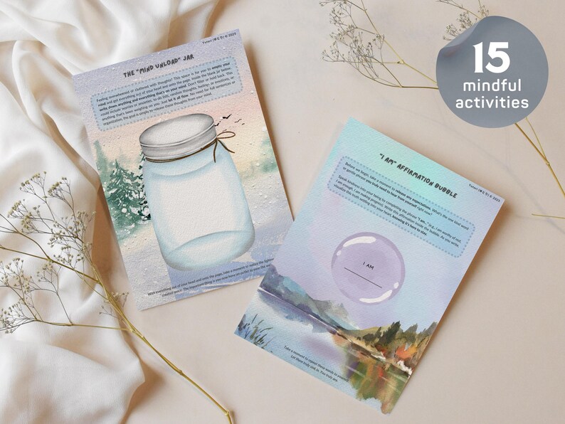 Op de afbeelding: Twee bedrukte activiteitenbladen met aquarelillustraties. E&eacute;n blad getiteld The Mind Unload Jar toont een glazen pot tegen een winterlandschap. Het andere blad getiteld I Am Affirmation Bubble toont een paarse bubbel boven een meerlandschap.