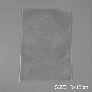 May include: Clear plastic sheet, 10 inches by 15 inches, for protecting and displaying items.