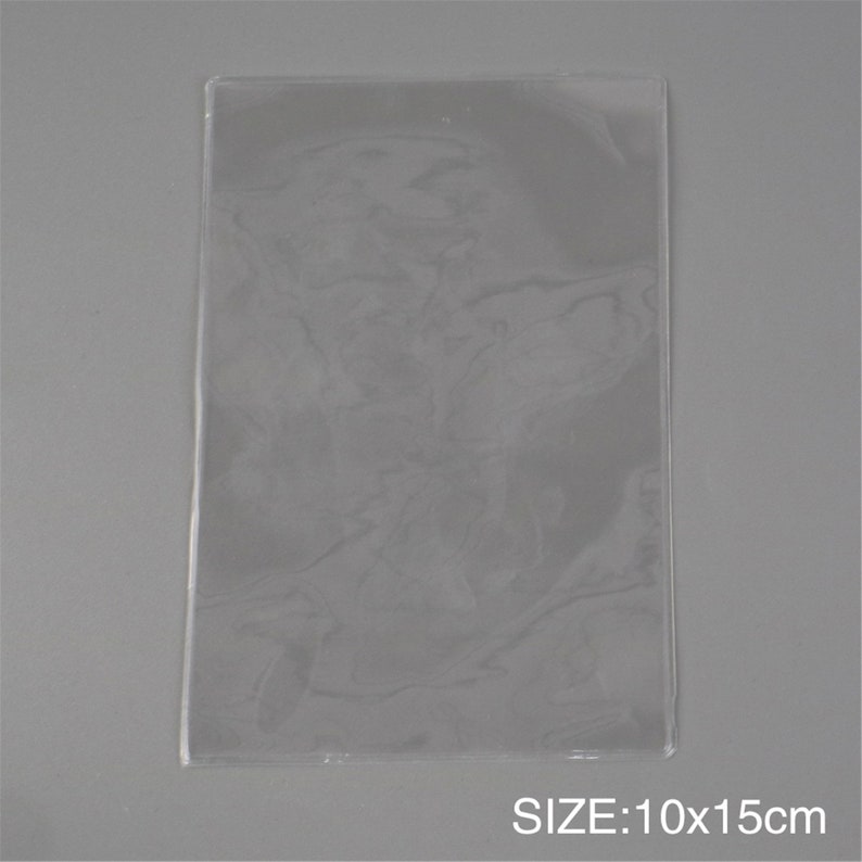May include: Clear plastic sheet, 10 inches by 15 inches, for protecting and displaying items.