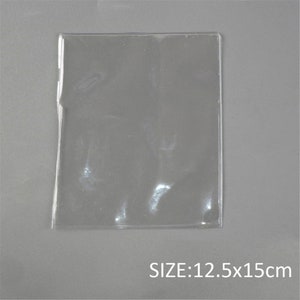 May include: Clear plastic sleeve for storing or protecting items. The sleeve is 12.5 inches by 15 inches.