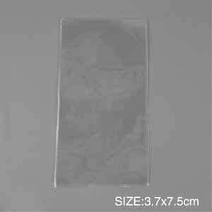 May include: Clear plastic sleeve, 3.7 x 7.5 inches in size.
