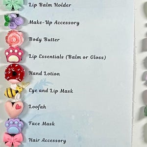 May include: A list of self-care products with the text "Body: Relax and Pamper." The items include an exfoliating scrub, lip balm holder, make-up accessory, body butter, lip essentials, hand lotion, eye and lip mask, loofah, face mask, hair accessory, clay mask, and facial accessory.