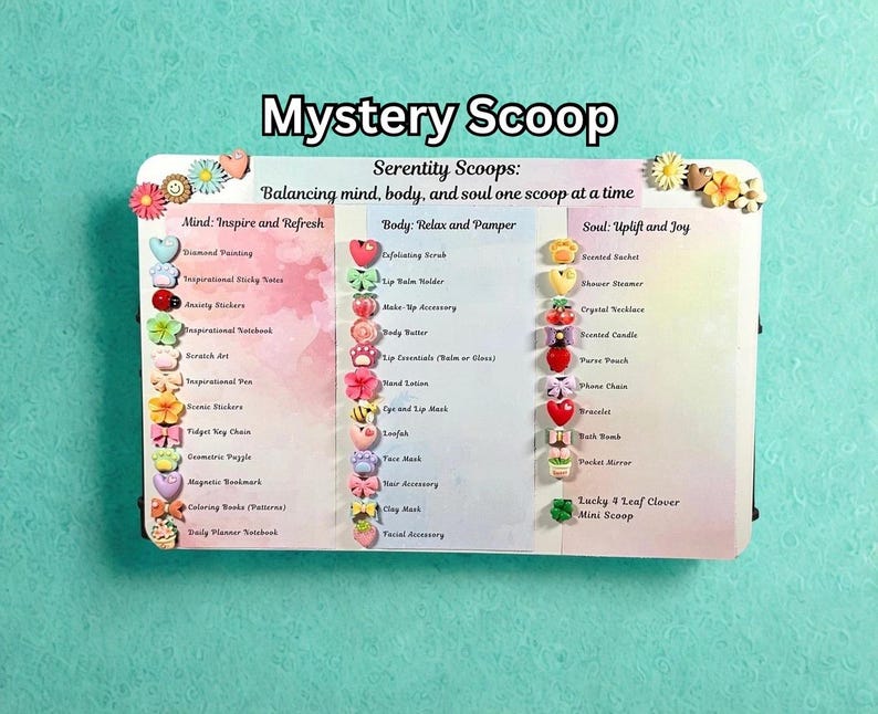 May include: A white board with the text "Mystery Scoop" and "Serenity Scoops: Balancing mind, body, and soul one scoop at a time." The board is decorated with colorful heart, flower, and bow-shaped embellishments. The board lists various self-care items.