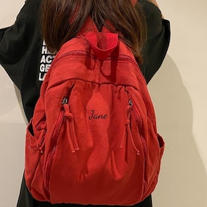 Mochila de lona roja lavada, minimalista, de gran capacidad, para la universidad y viajes, en colores sólidos: negro, verde, rojo, blanco y marrón.