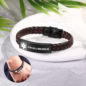 May include: Brown braided leather medical ID bracelet with a black stainless steel clasp. The black ID plate has a white medical symbol and the text "ICECALL:888-888-88".