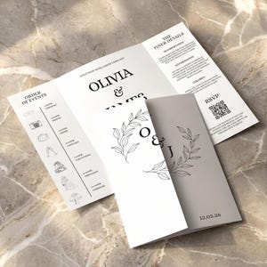 Könnte beinhalten: Eine dreifach gefaltete Hochzeitseinladung mit minimalistischem Design. Die Einladung zeigt die Namen "Olivia & James" und enthält Veranstaltungsdetails, RSVP-Informationen und ein Datum. Das Design beinhaltet florale Elemente und einen QR-Code.