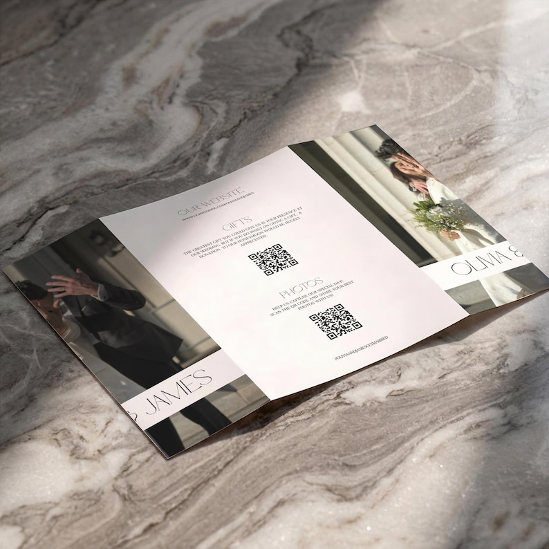 May include: A folded wedding invitation with the names "Olivia & James" and the words "Gifts" and "Photos" printed on it. The invitation includes QR codes and is set against a marble background.