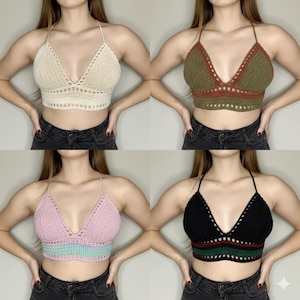 May include: Four crochet halter tops in cream, olive green, pink, and black. Each top features a V-neck design and a halter strap. The pink top has a light blue stripe, and the black top has a red and green stripe.