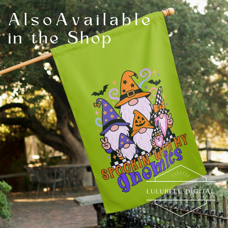 May include: A green Halloween garden flag featuring a group of gnome characters with white beards and pointed hats. The flag has the text "Spookin' With My Gnomies" and "Also Available in the Shop".