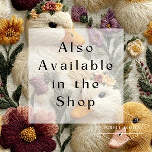 May include: Embroidered artwork featuring ducklings with floral crowns and colorful flowers. The text "Also Available in the Shop" is overlaid on the image. The artwork showcases detailed stitching and a natural color palette.